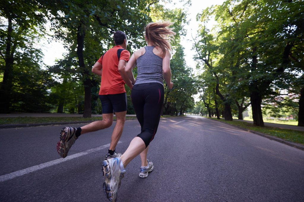 couple jogging to illustrate biggest benefits of weight loss